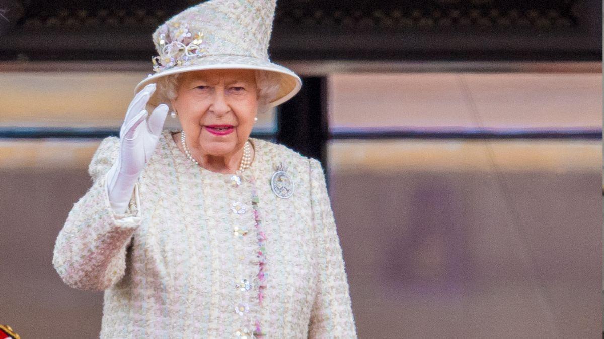 Image of Queen Elizabeth's trademark accessories include her Launer London handbag.