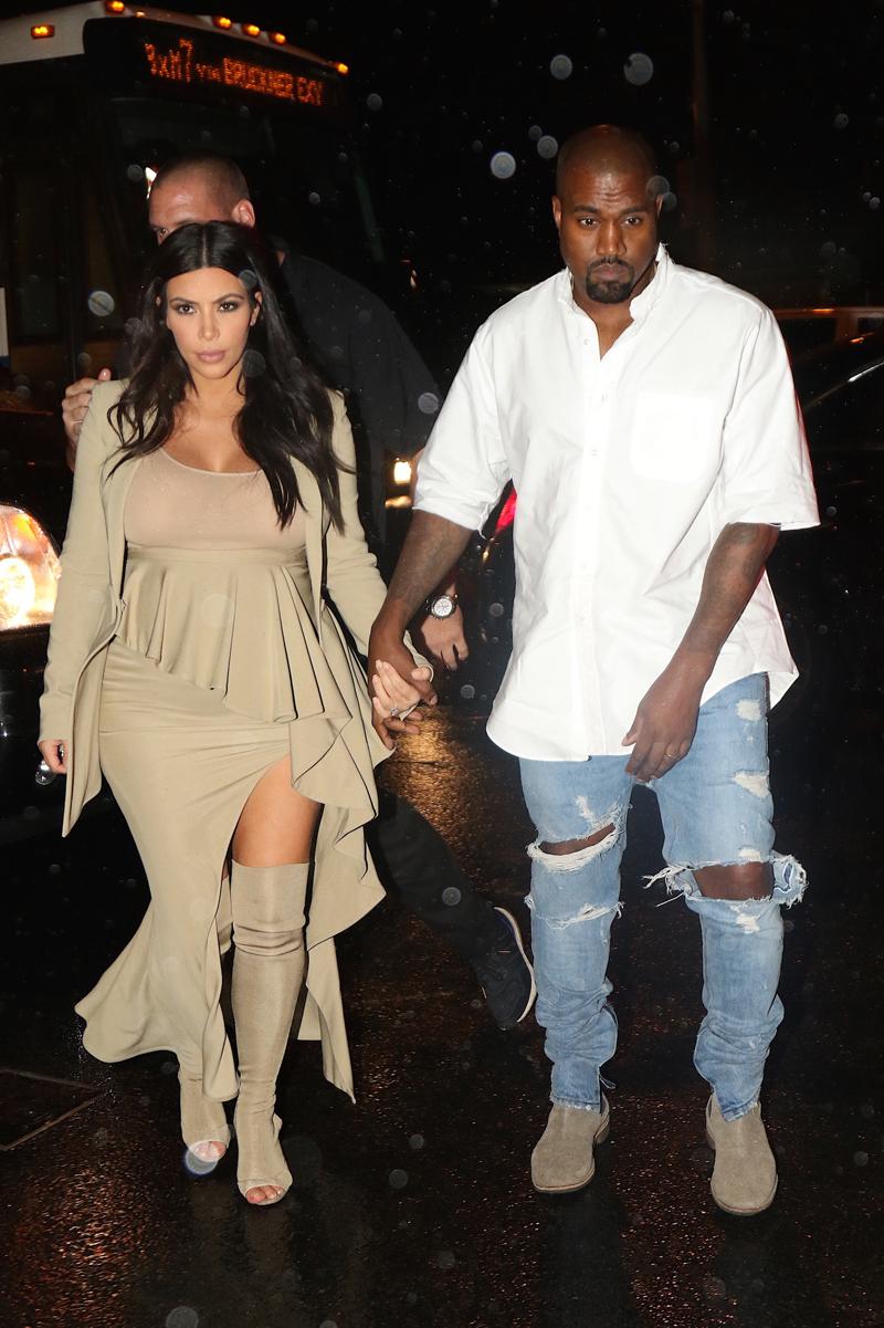 Kim Kardashian and Kanye West arrive to Rihannas block party at the Edition Hotel this evening in NYC