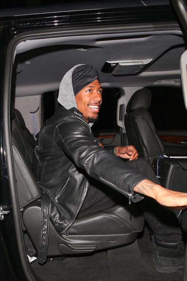 Nick Cannon leaves Mr Chow with a mystery woman