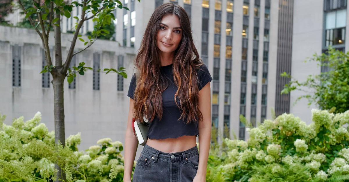 Emily Ratajkowski Shows New York Yankees Pride in Asics Sneakers & Crop Top