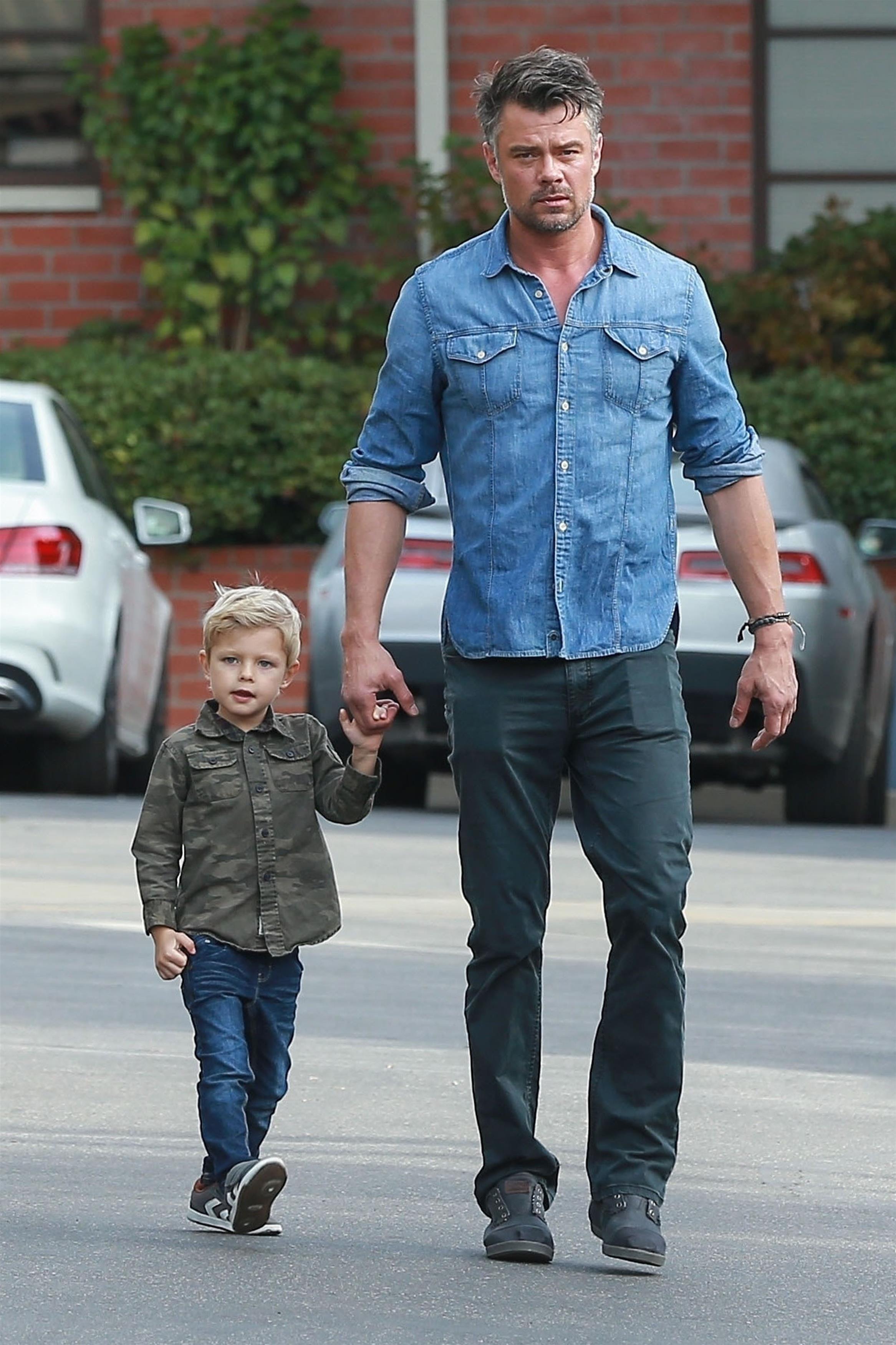 Josh Duhamel and his son attend church services