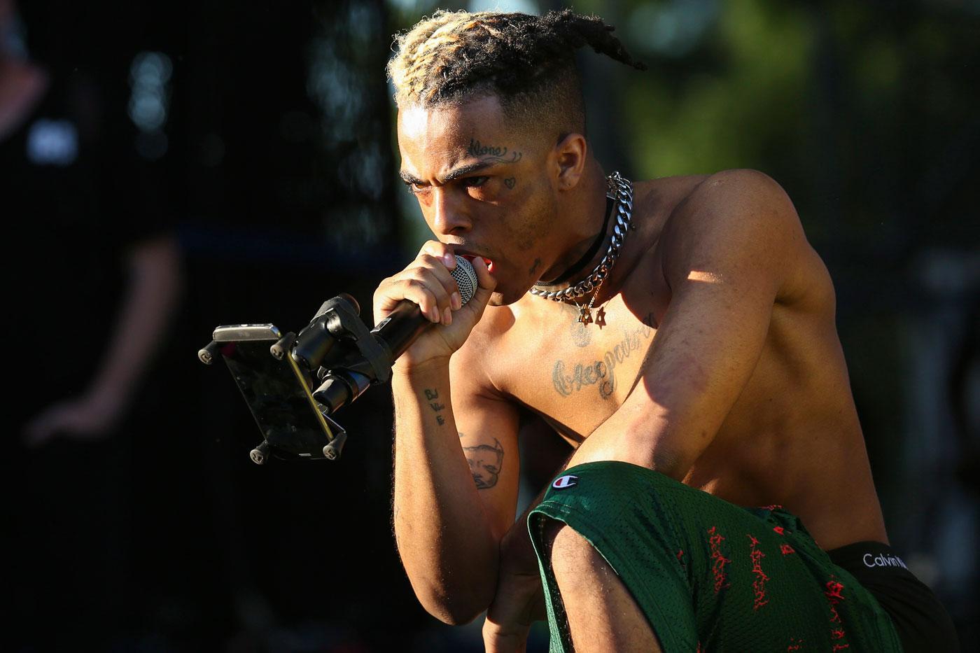 fans chase xxxtentacion ex girlfriend from vigil over abuse claims 02