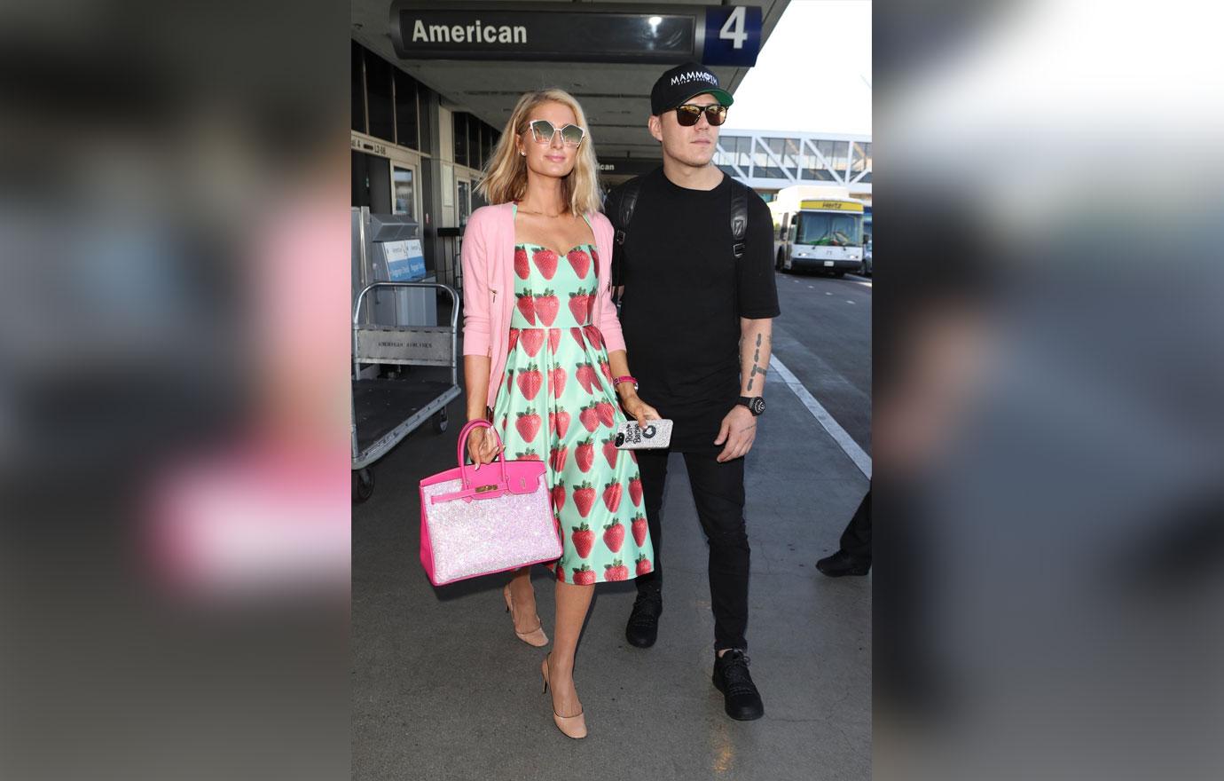 Paris Hilton and fiancee Chris Zylka depart LAX together