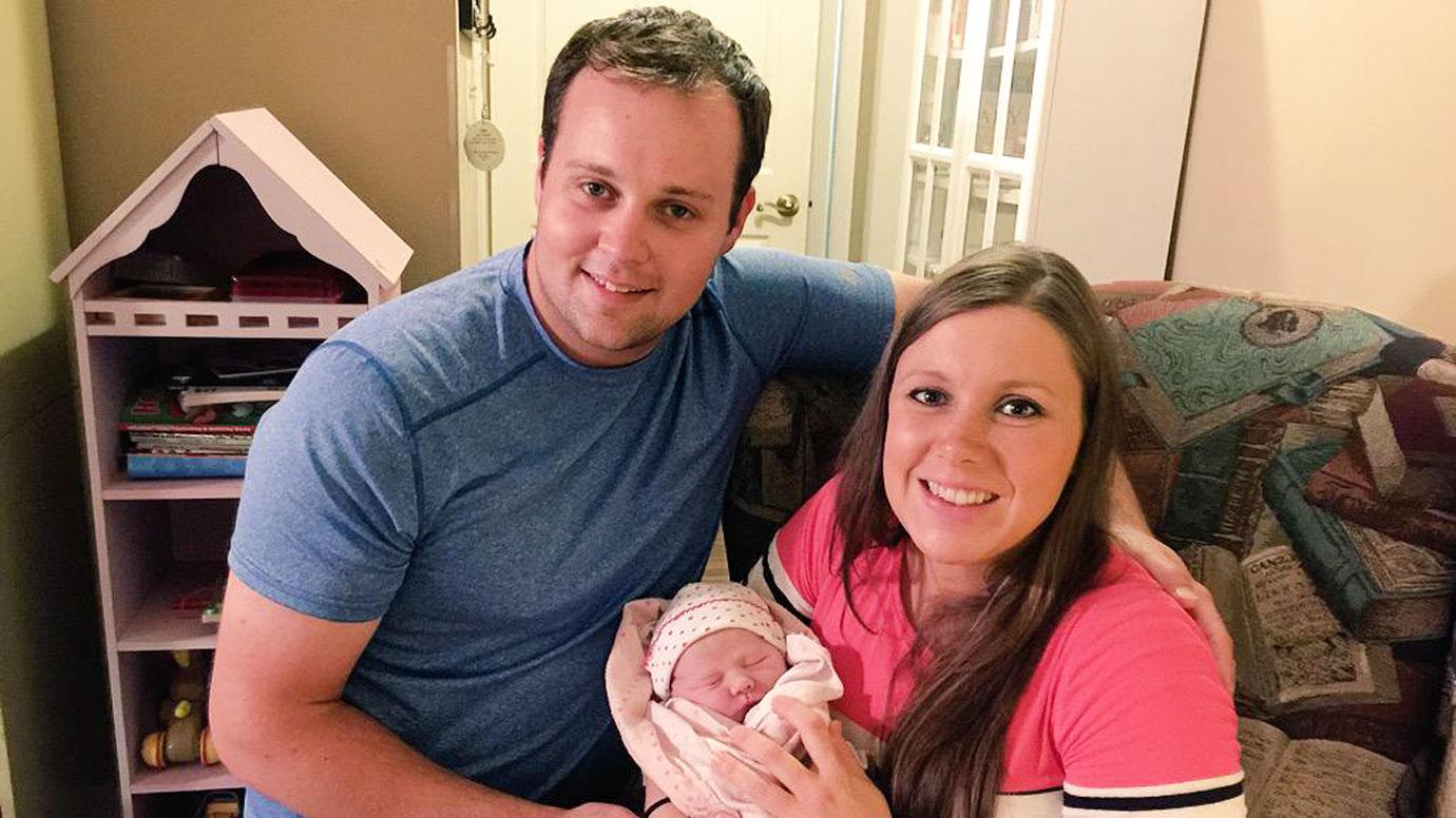 josh duggar wife anna duggar hand in hand court room pretrial child porn case