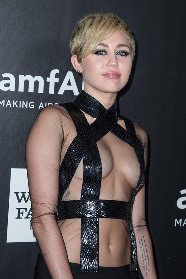 Miley Cyrus attends amfAR LA Inspiration Gala