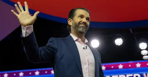 Photo of Donald Trump Jr. waving.
