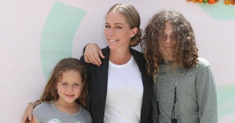 kendra wilkinson shares rare photo son hank baskett jr prep school pp
