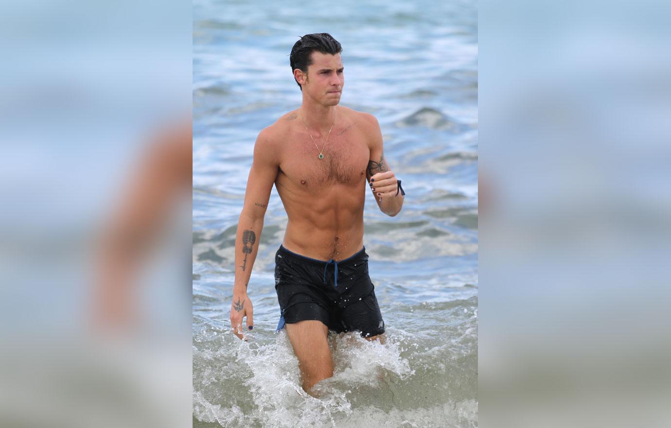 shawn mendes takes a dip in the ocean while in miami