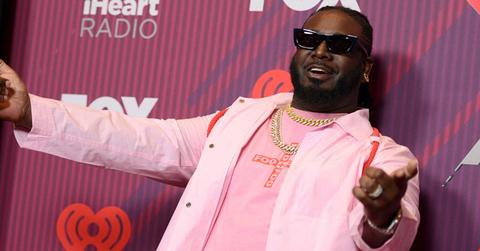 T-Pain poses in the press room at the iHeartRadio Music Awards, at the Microsoft Theater in Los Angeles t-pain broke money kids