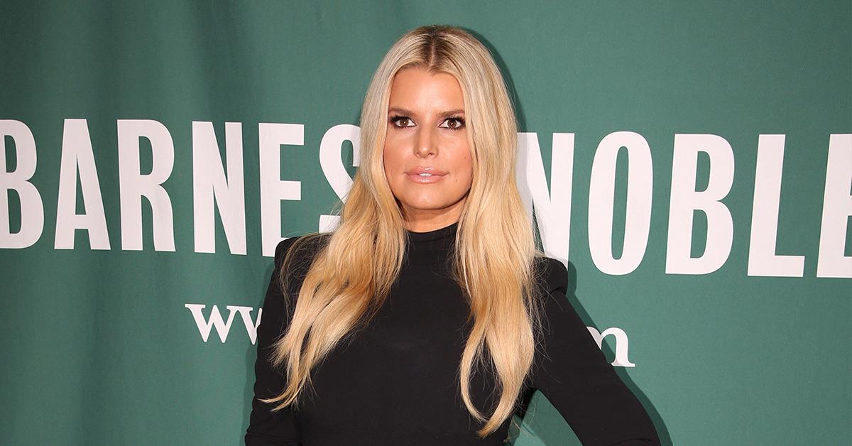 Not long now! Jessica Simpson dresses her huge baby bump in black lace as  she goes hand-in-hand with fiancé Eric Johnson