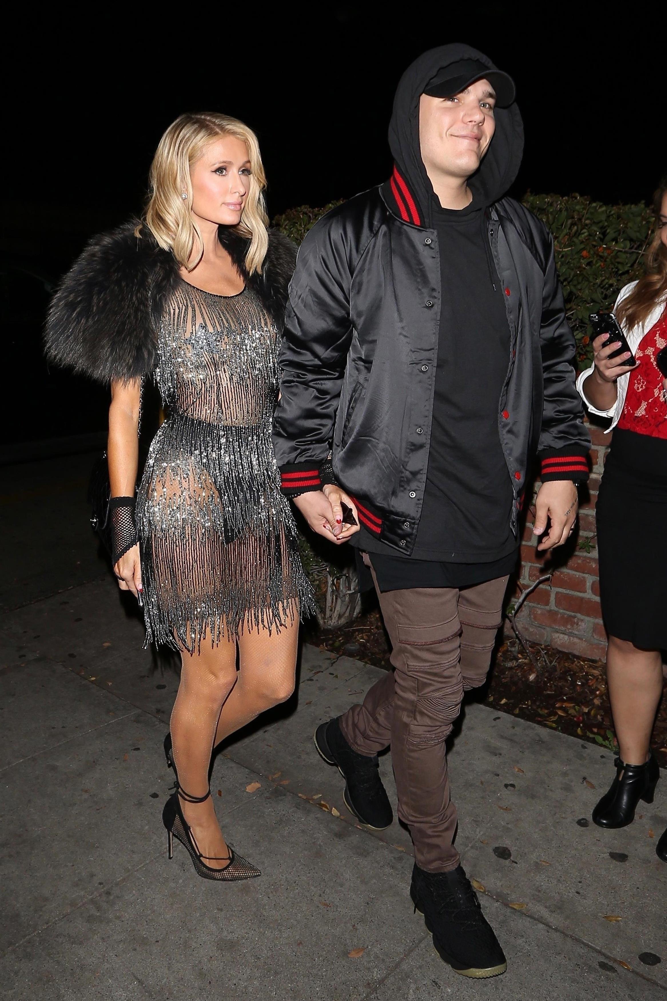 Paris Hilton and Chris Zylka arrive at Delilah for date night