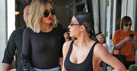 Kim kardashian shows breasts photos kourtney khloe 04