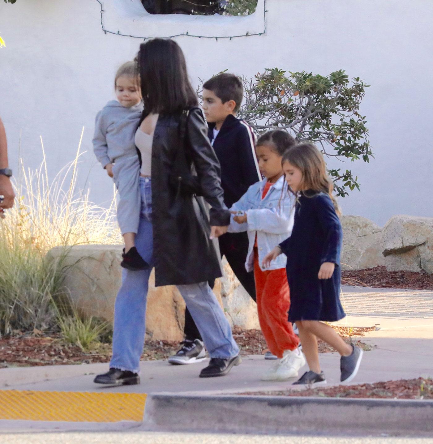 Kourtney Kardashian seen at a restaurant in Malibu with her kids and her nieces.