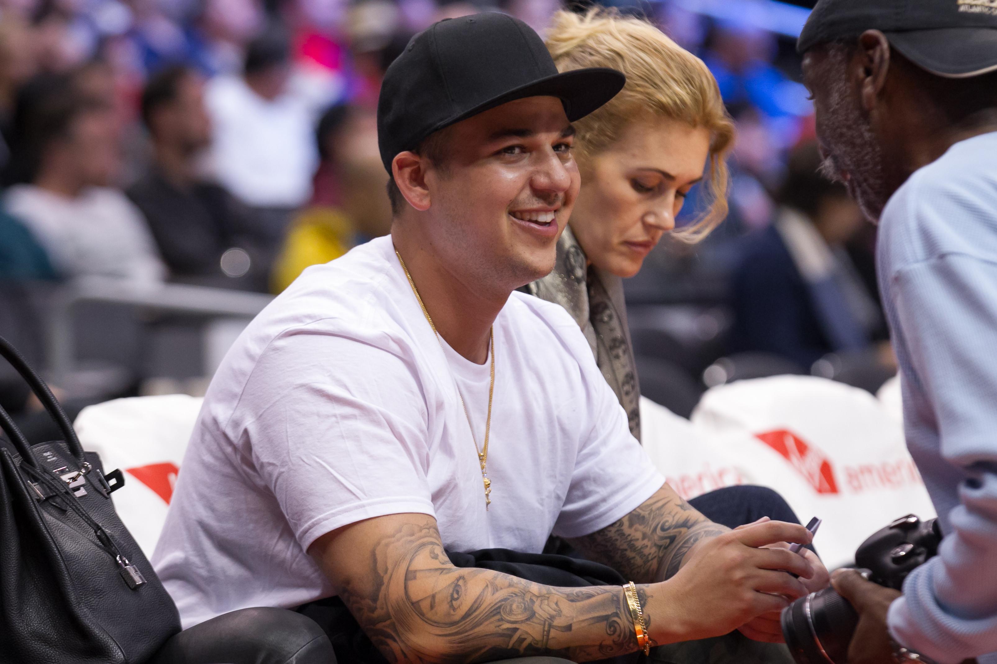 Khloe Kardashian Odom and Rob Kardashian attend the Clippers game to cheer on Lamar Odom