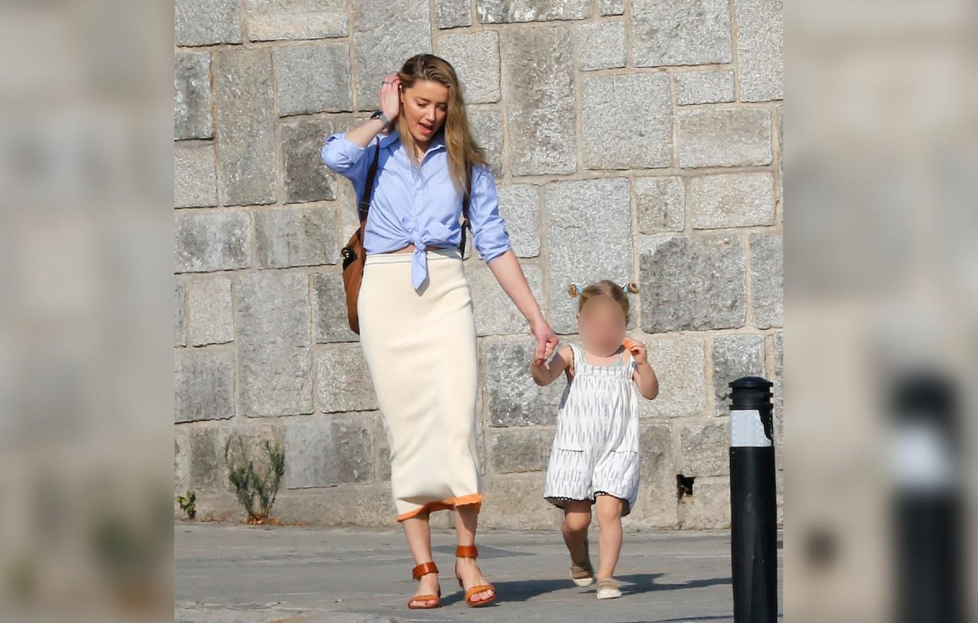 amber heard seen in madrid with daughter ok