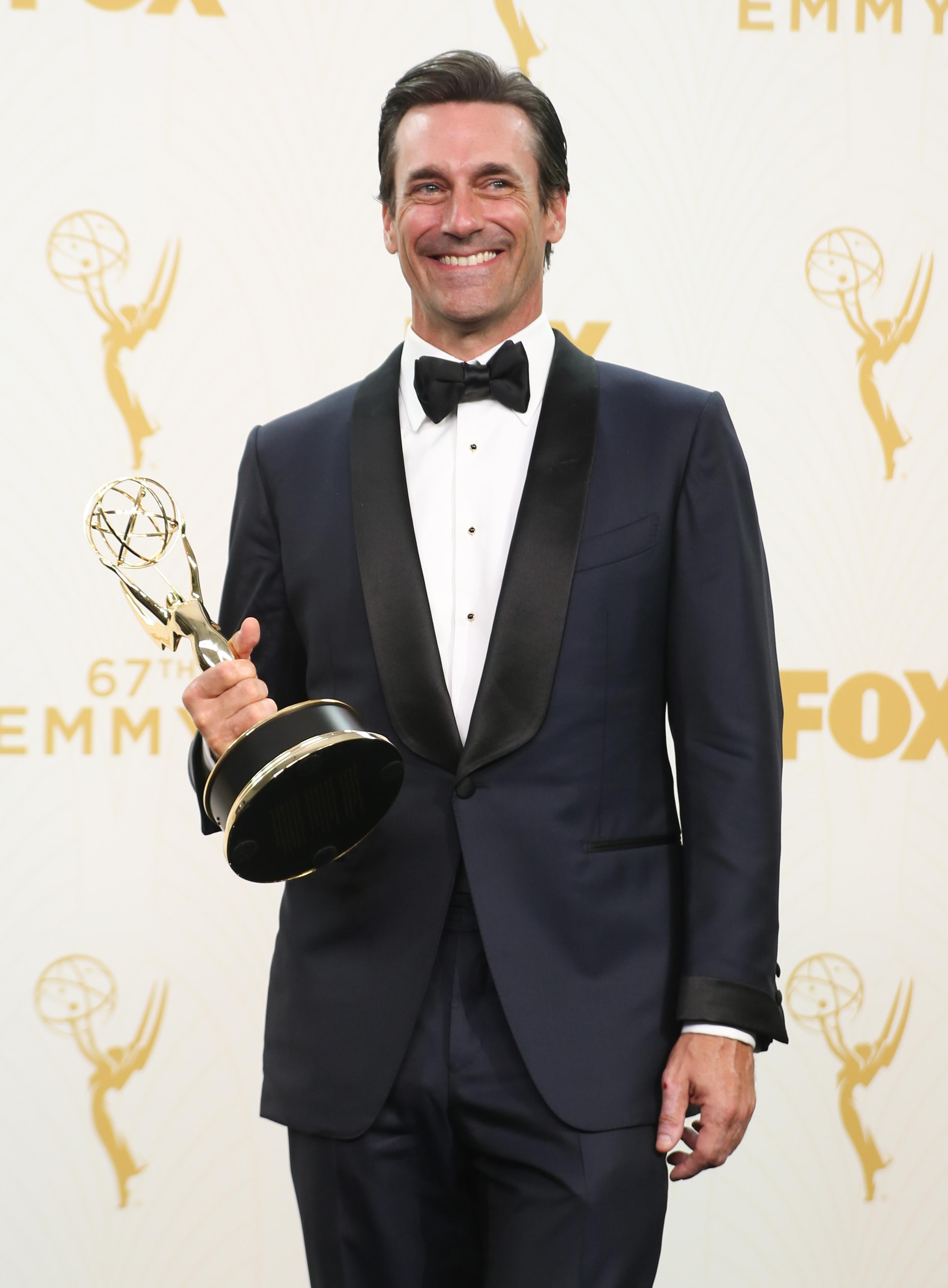 Jon Hamm shows off his Emmy for Outstanding Lead Actor in the pressroom for the 67th Annual Primetime Emmy Awards at Microsoft Theater in Los Angeles, California.