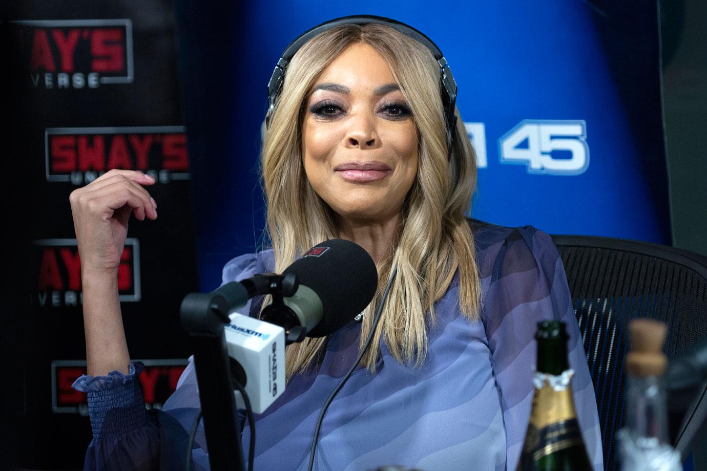 Wendy williams with headphones and mic