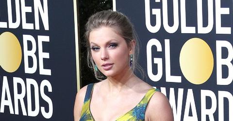 Taylor Swift Wearing A Blue and Yellow Dress
