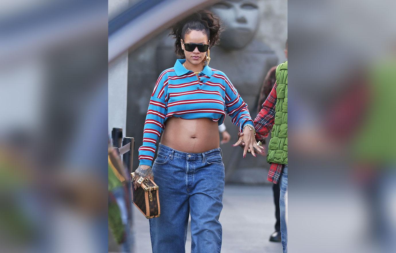 rihanna shows off baby bump as she walks arm in arm with aap rocky