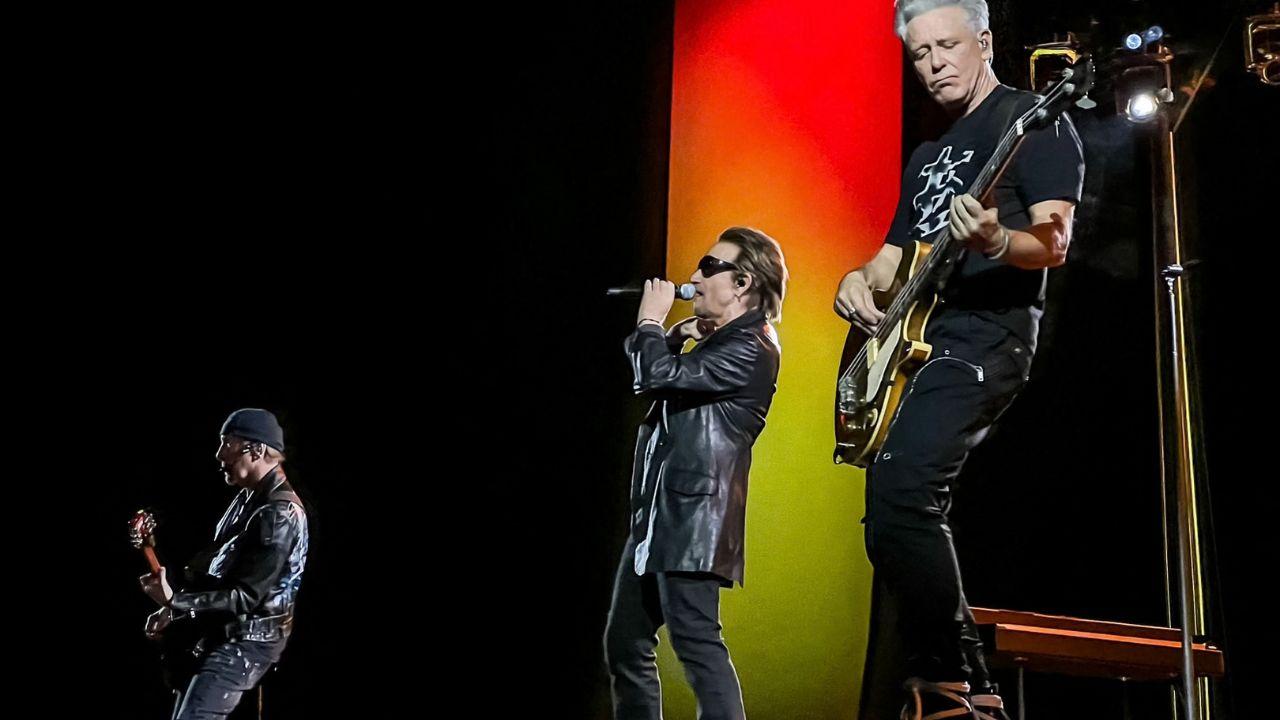 Image of U2 performing on stage.