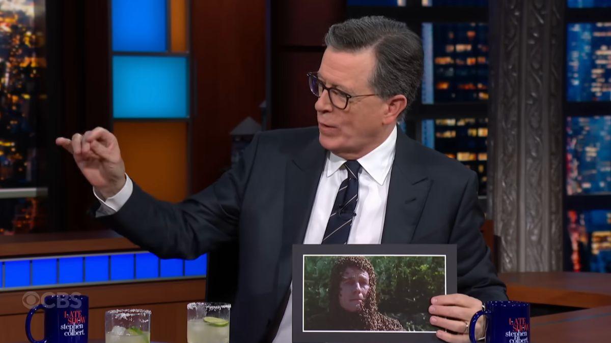 Image of Stephen Colbert questioned how Bryan Cranston was successfully covered in 60,000 bees.
