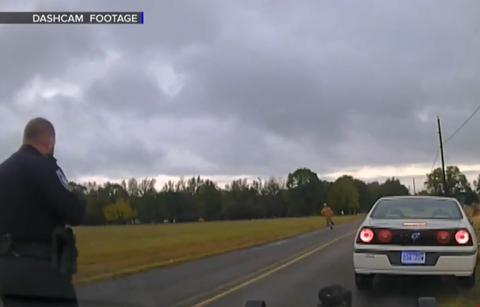 hitchhiker flee vehicle like forrest gump police dashcam
