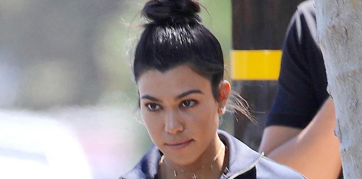 Kourtney Kardashian stops for a restroom break after a long drive