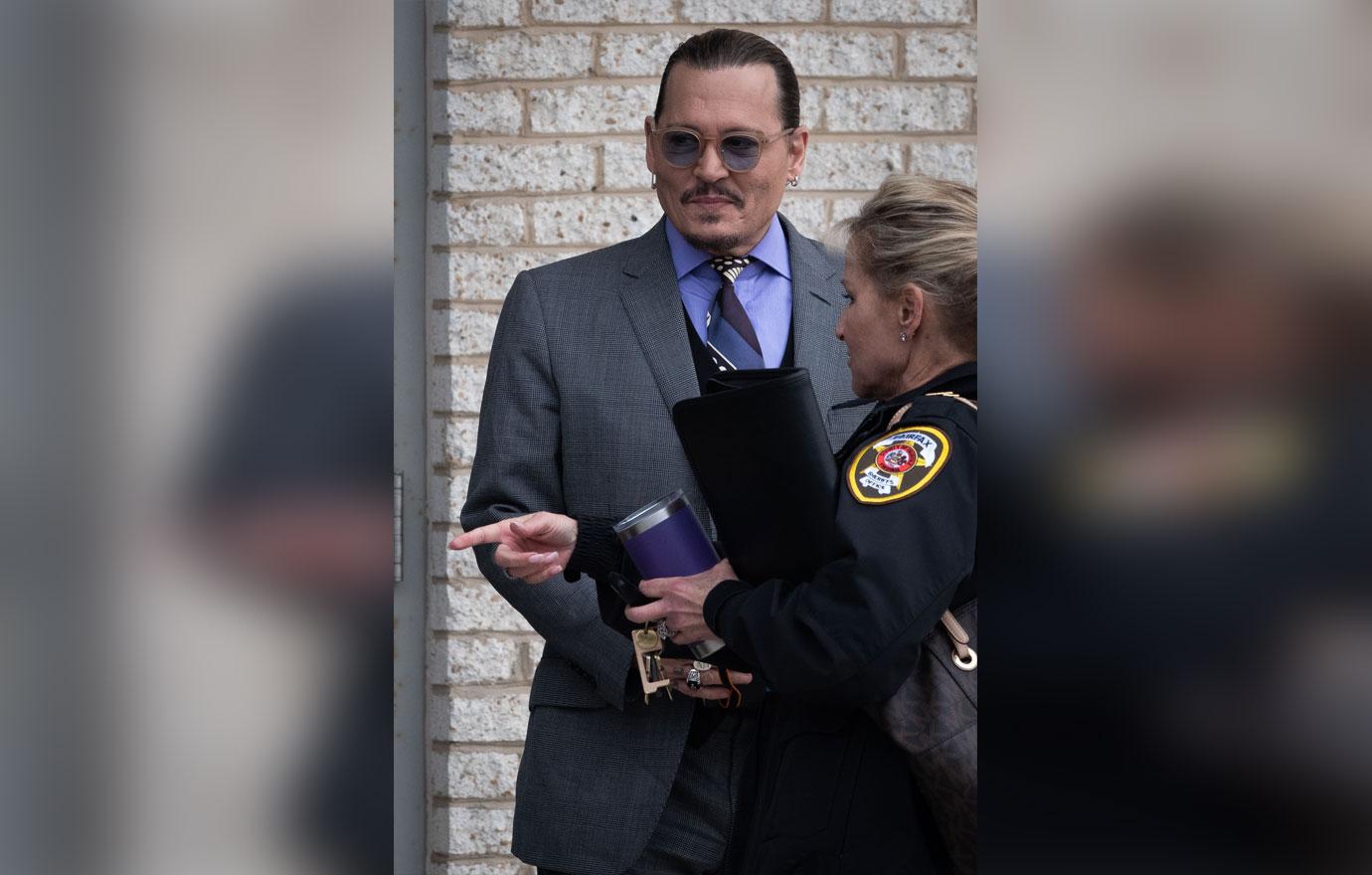 johnny depp his female attorney ignite social media frenzy over friendly interactions