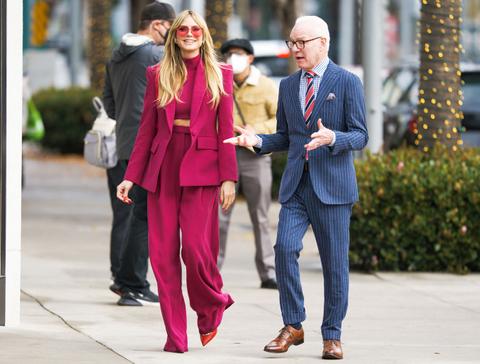 heidi klum flashes toned figure in hot pink suit during filming session with tim gunn on rodeo drive in la