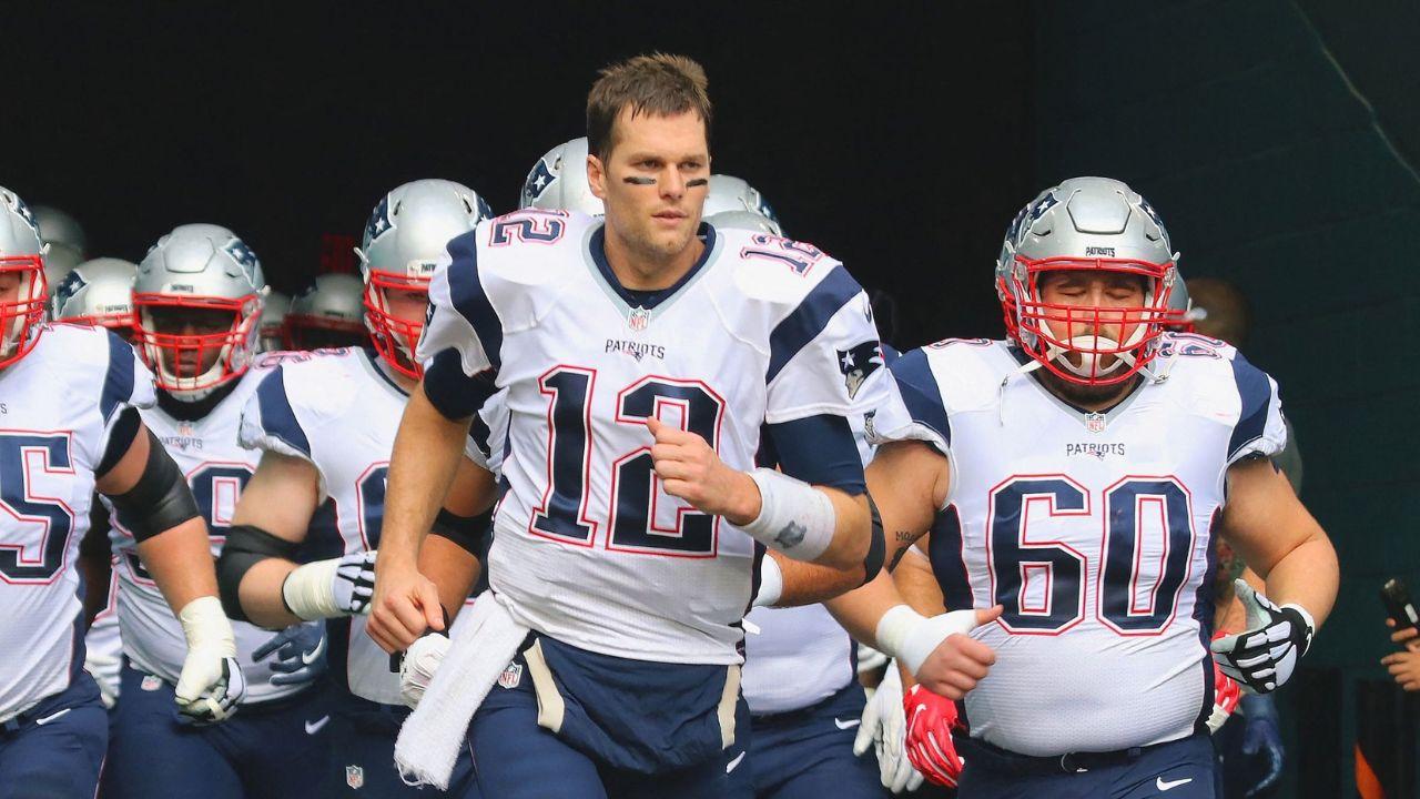 image of Tom Brady said he enjoys working with Kevin Burkhardt, Erin Andrews and Tom Rinaldi.