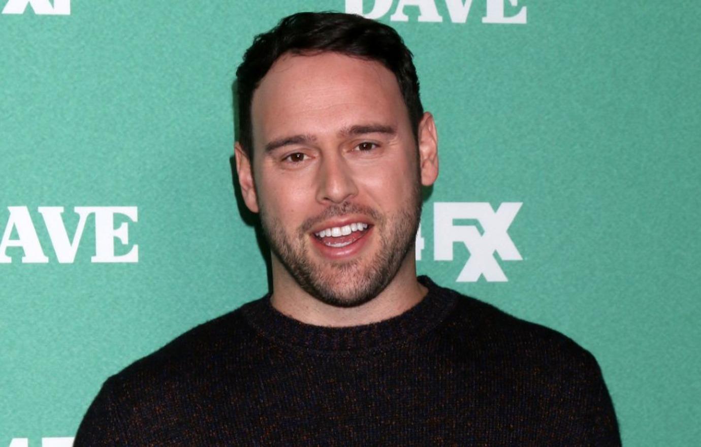 justin bieber fans slam manager scooter braun