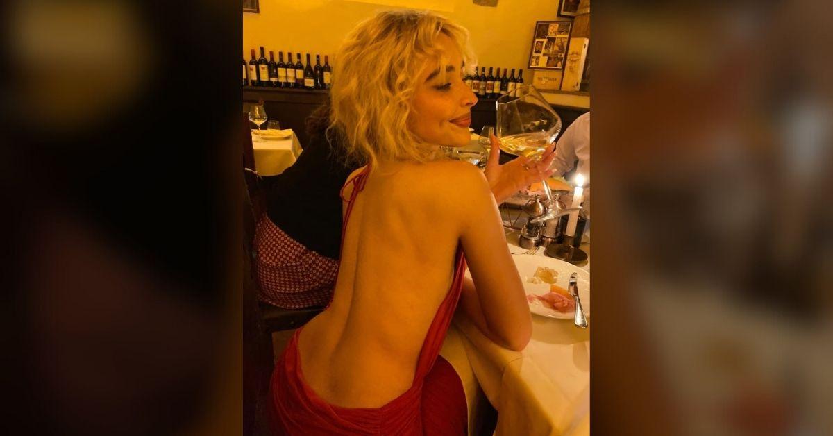 image of Sabrina Carpenter showed off her curves in a daring backless dress.