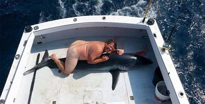 Jimmy johns founder denies posing naked shark 04