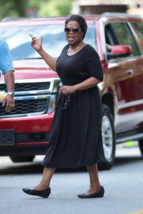 Oprah Winfrey, 69, shows off skinnier-than-ever waist in tight white dress  at the Smithsonian after drastic weight loss