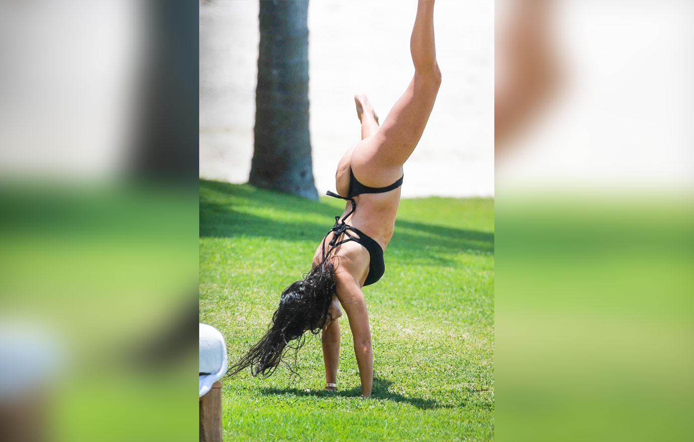 PICS] Kim Kardashian Displays Curves In Barely-There Bikini Thong!