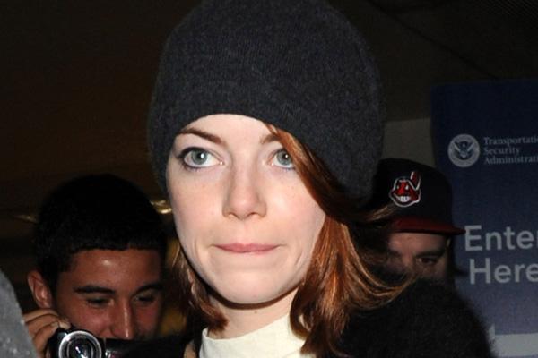 Emma Stone dressed for cold weather at LAX