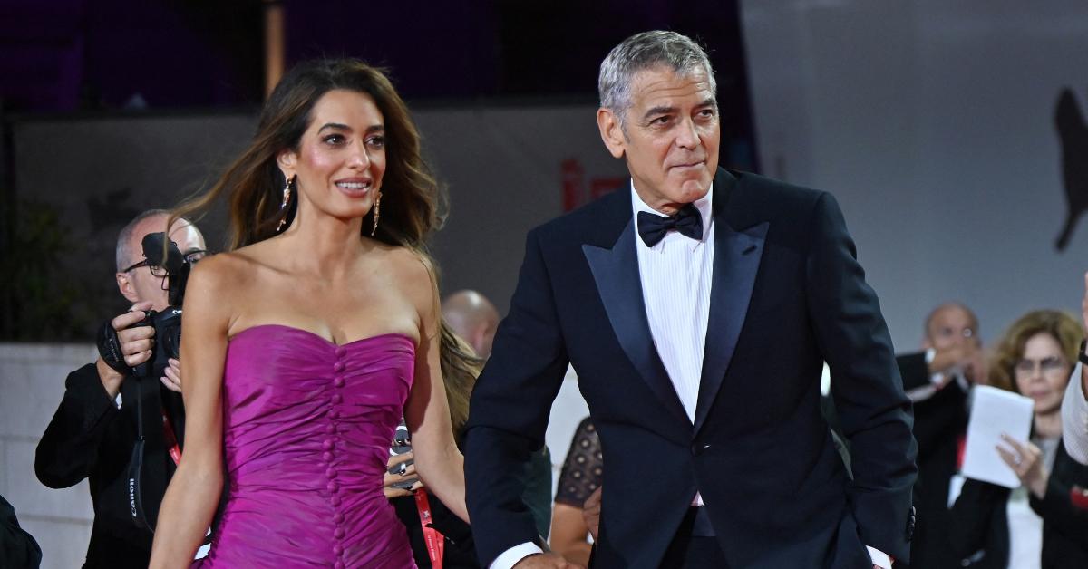 Image of George Clooney made it out for red carpet photos despite not feeling well.