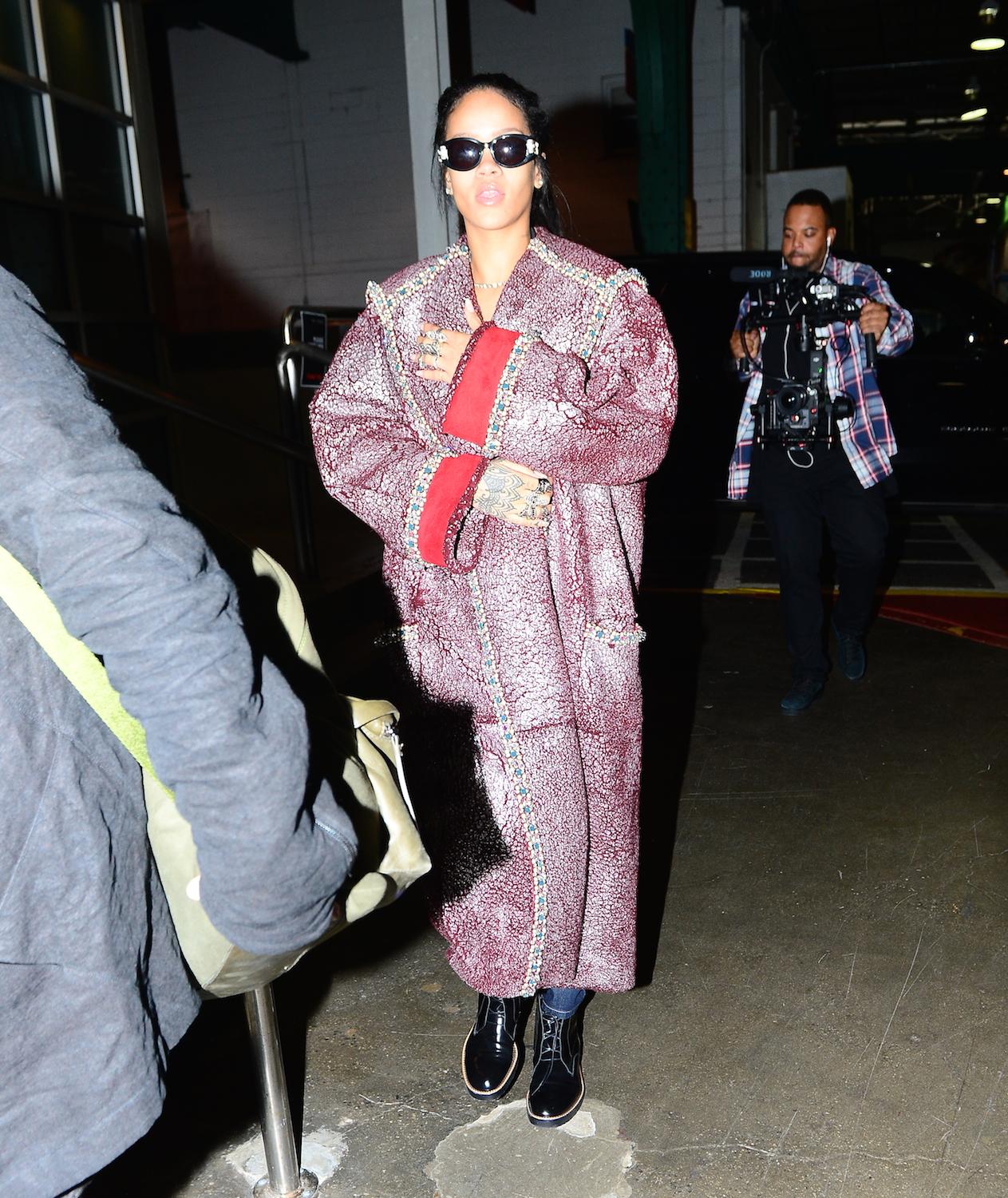 Rihanna wears a crazy coat as she heads to a photoshoot for her album cover