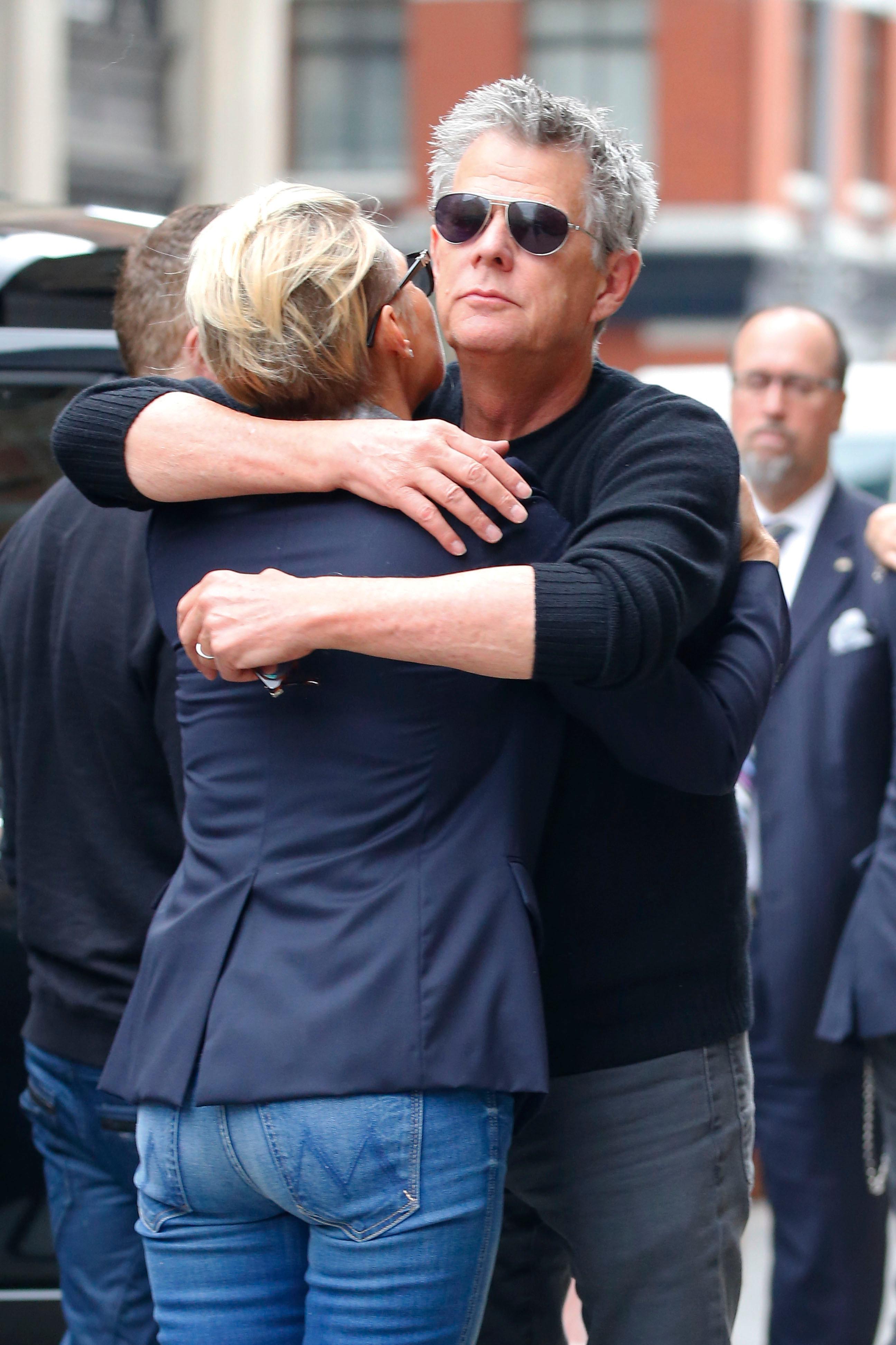 Yolanda Foster and David Foster hug and kiss on the street in New York City