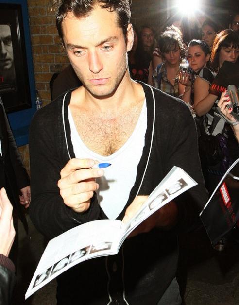 PHOTOS: Jude Law Still Signing His Life Away