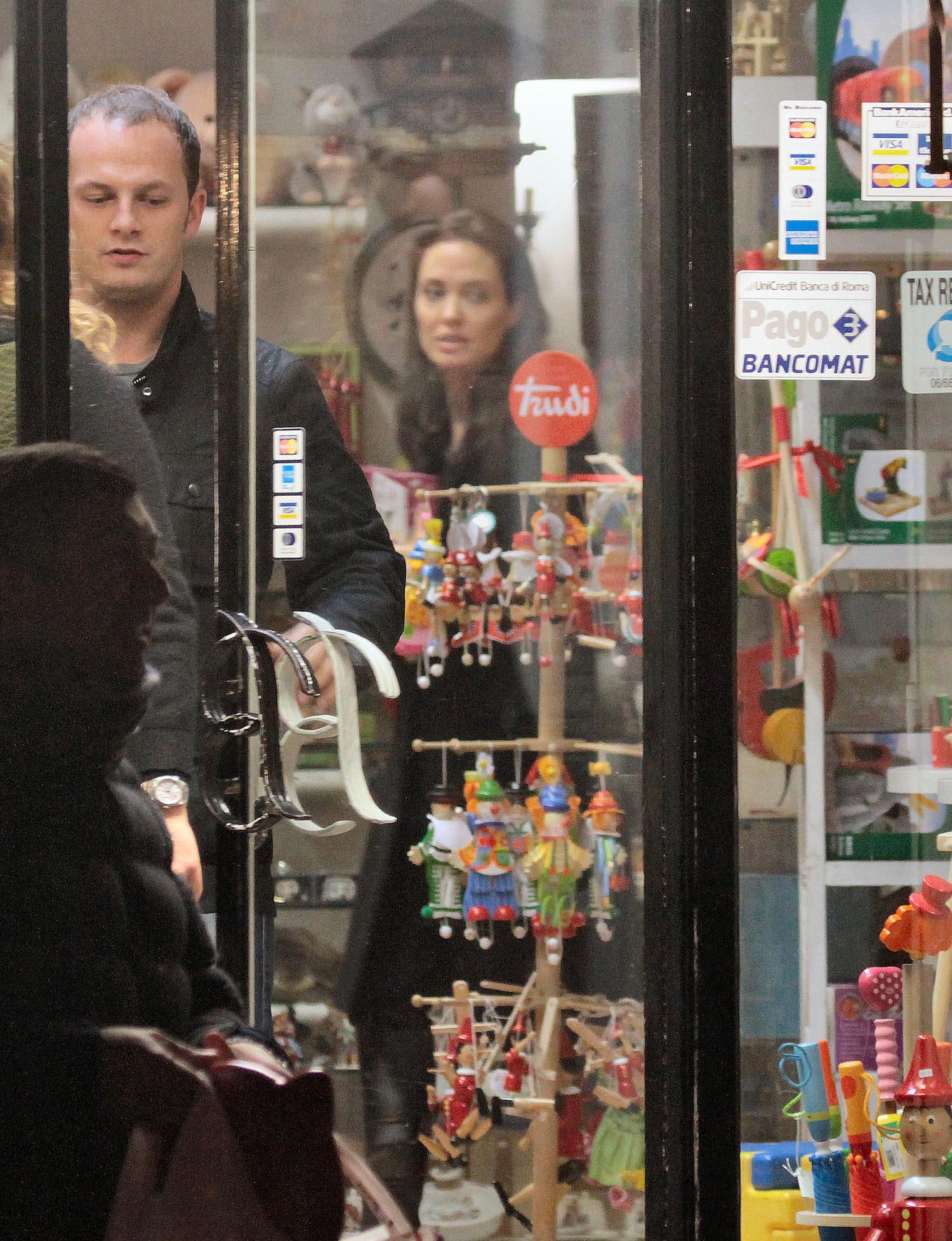 Angelina Jolie doing some shopping with kids in a toy shop in Rome