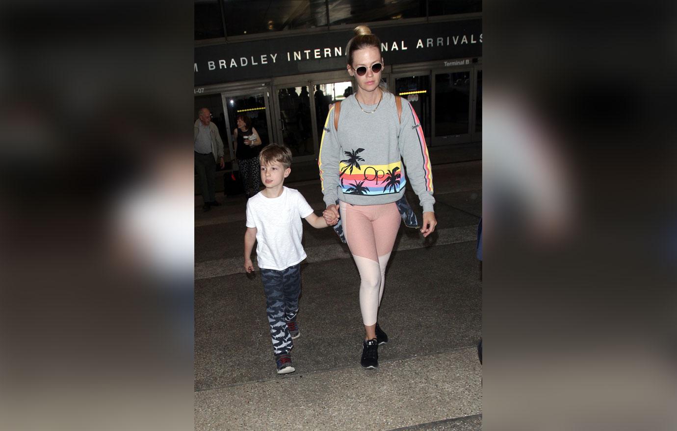 January Jones and her son Xander wear matching colored tops for their day  out in LA