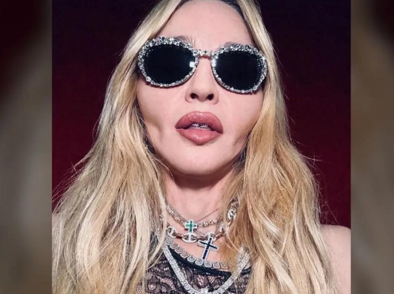 madonna posts topless photos eating haters attention