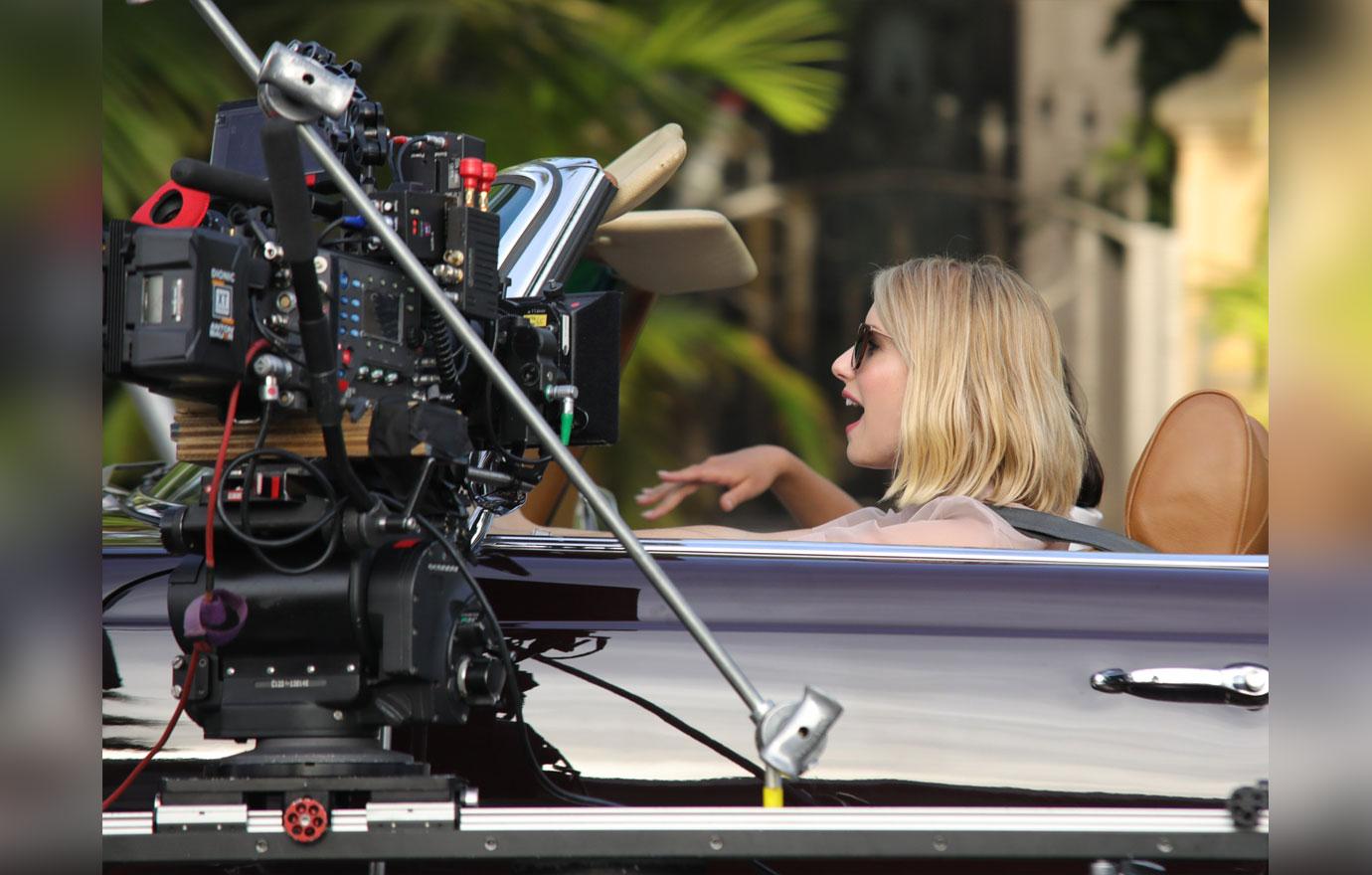 EXCLUSIVE: Emma Roberts see filming scenes in a vintage convertible