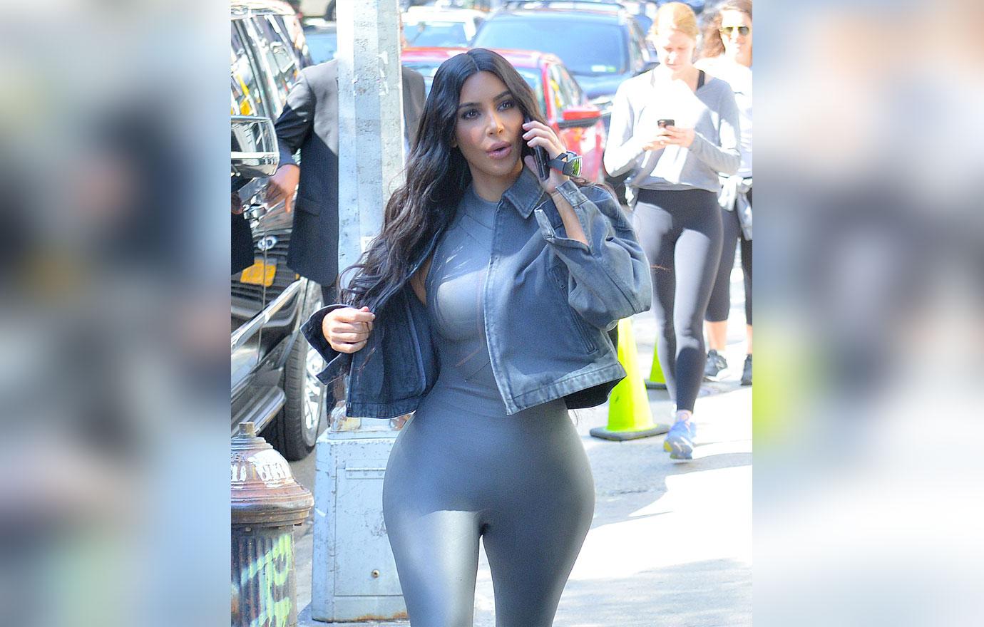 Kim Kardashian takes phone during walk in New York