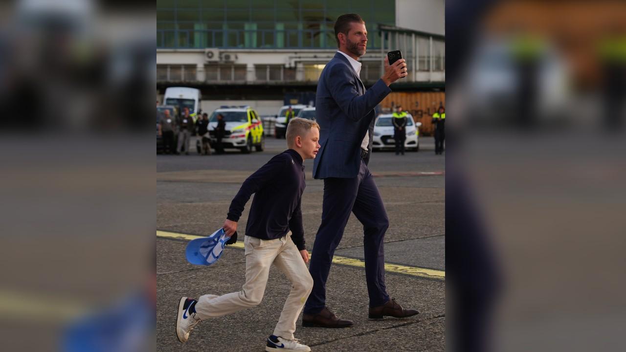 Image of Donald Trump Jr. walked alongside one of his sons as the Trump family wrapped up its time in Ireland.