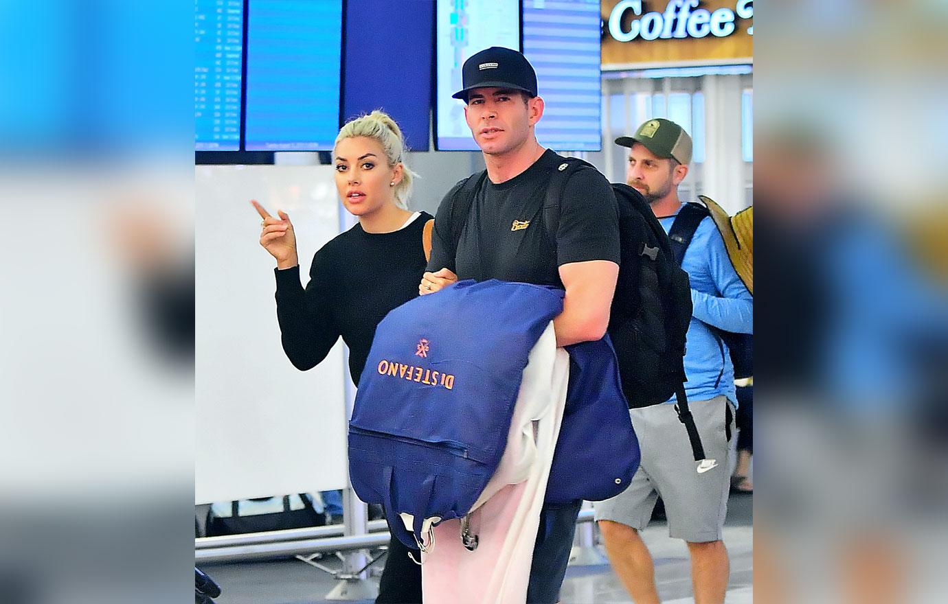 EXCLUSIVE: Tarek El Moussa and Heather Rae Young arrive into LAX