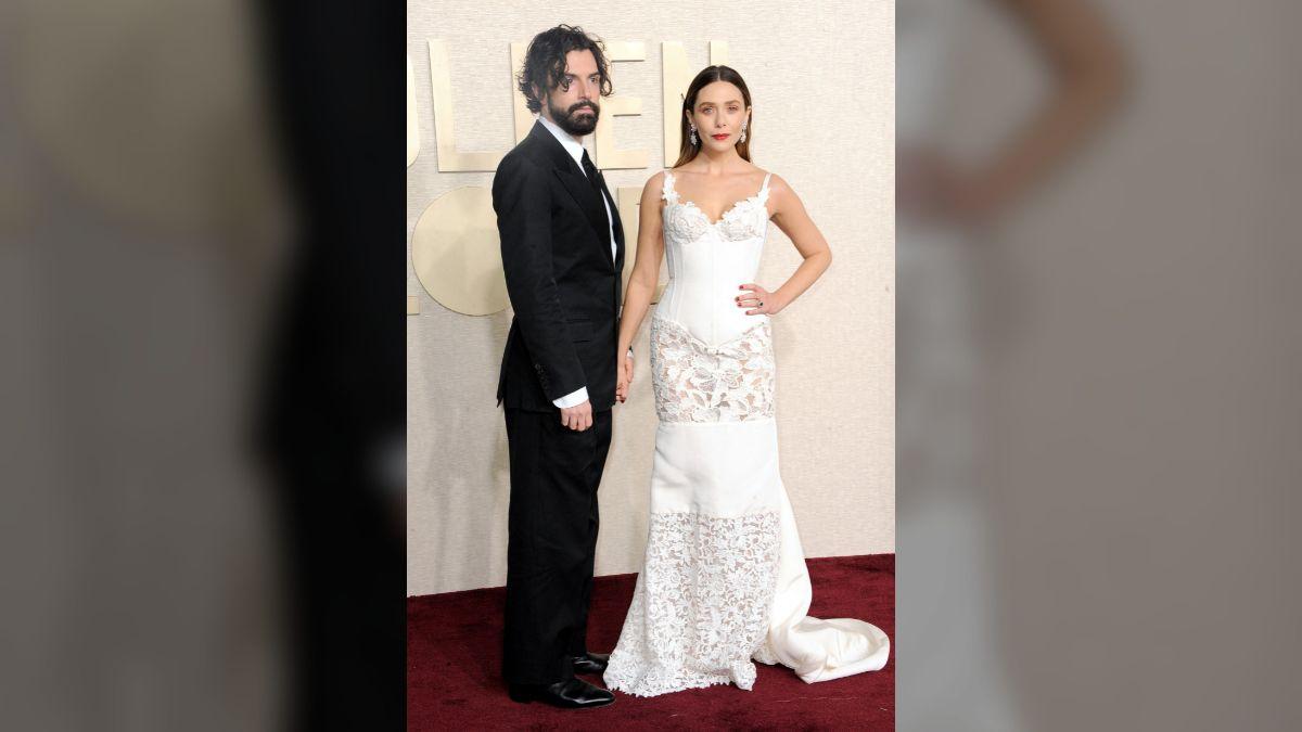 Photo of Elizabeth Olsen and Robbie Arnett were first romantically linked in 2017.