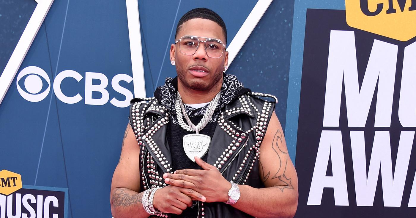 Nelly Wc Rapper Rapper Nelly Acts As Bartender At Florida Event, Announces MoShine