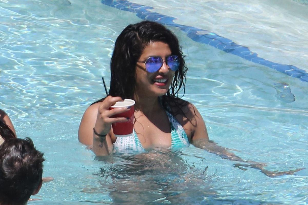 Priyanka Chopra shows off her bikini body poolside